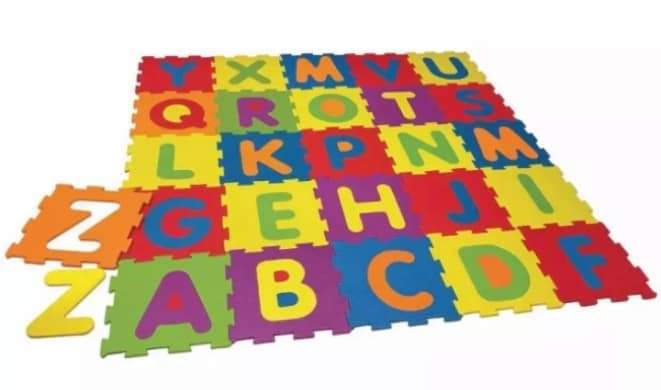 Colorful alphabet mat with letters on a white background