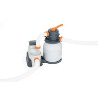 Pool filter pump with hoses on a white background