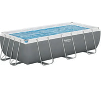 Rectangular above-ground pool with clear water on a white background