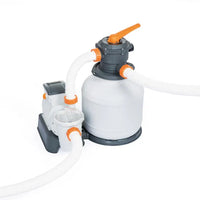 Pool filter system with hoses and connectors on a white background