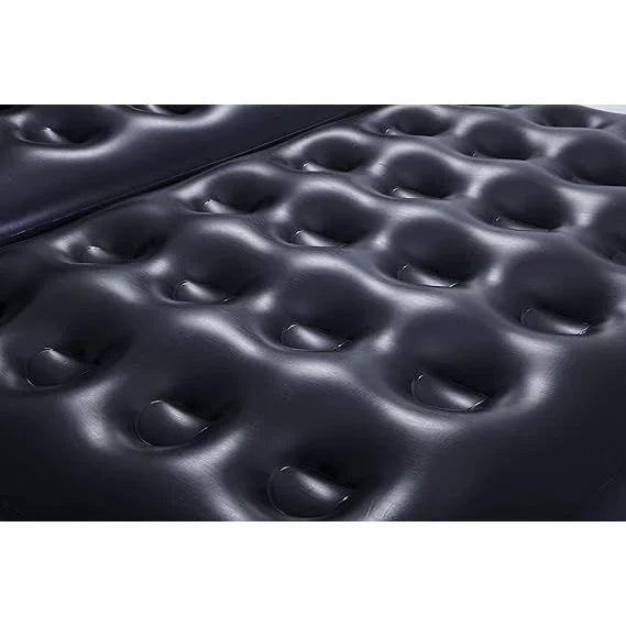 Close-up of an inflatable mattress with a pattern of raised dome shapes.