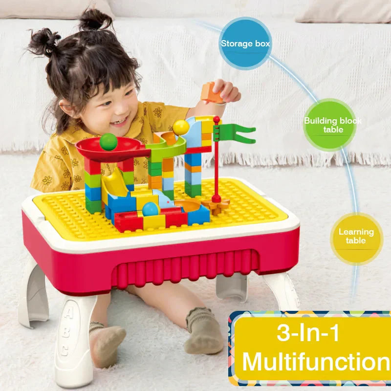 Child playing with a colorful building block table with labeled features on a white couch.