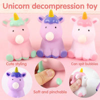 Unicorn decompression toy with various styling options on a pink background