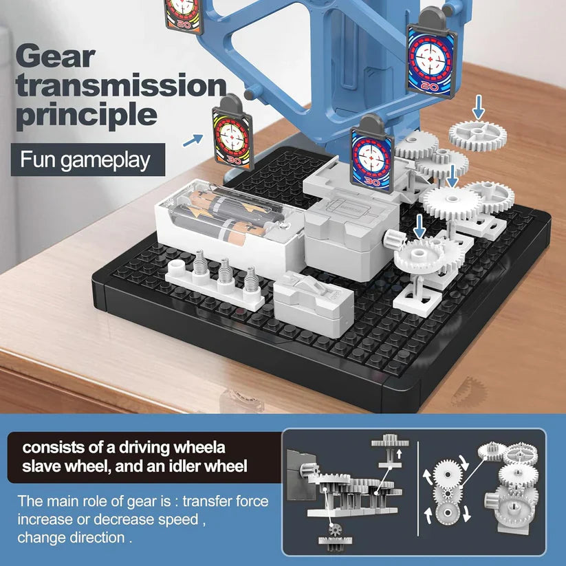 Mechanical model of gear transmission principle on a wooden surface with text explaining the components.