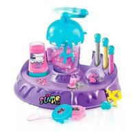 Blue elephant toy with measurements and a hand holding it on a green background