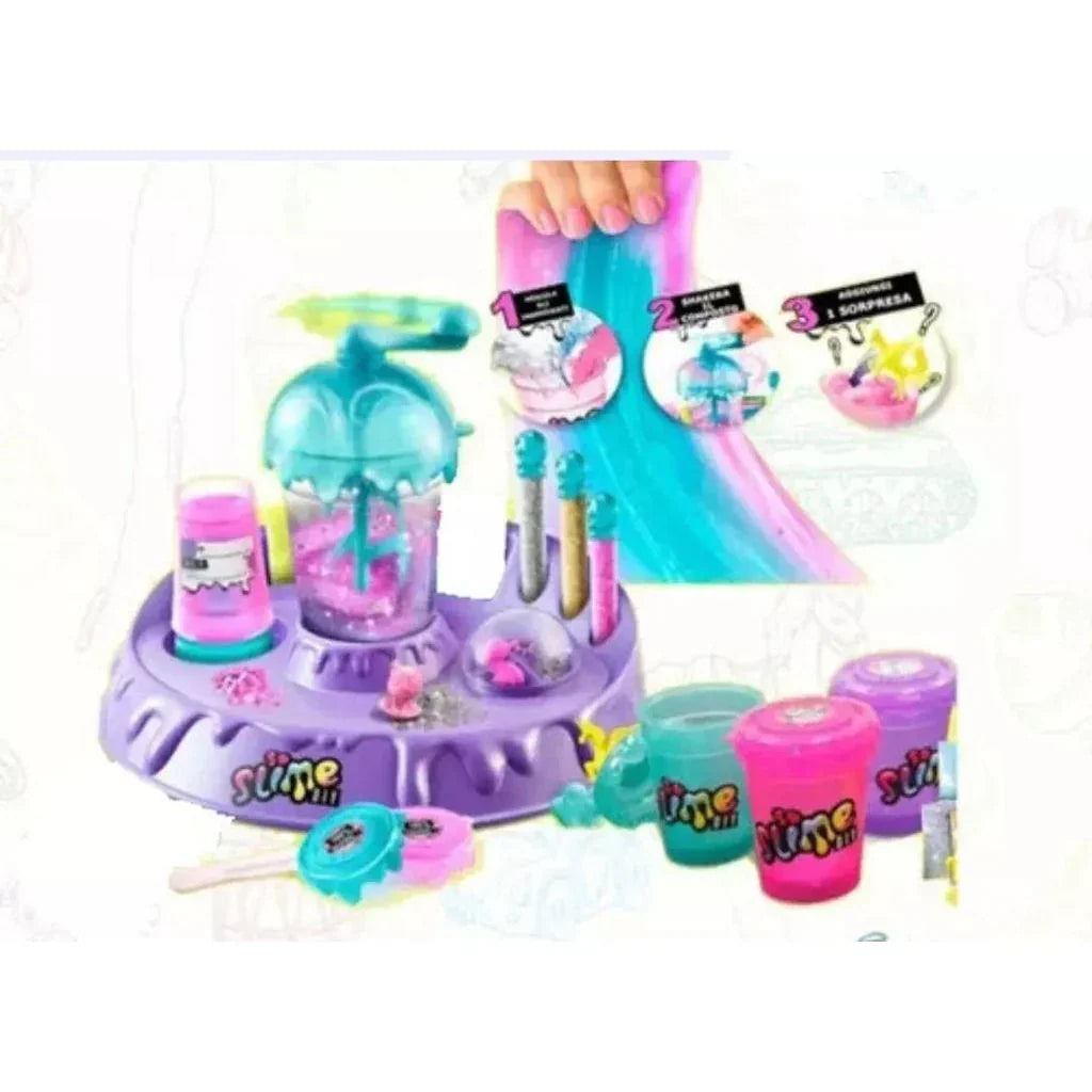 Two-layer cake with colorful animal figurines and greenery on a light blue background