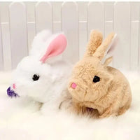 Two plush rabbit toys, one white and one beige, sitting on a white surface with a white background.