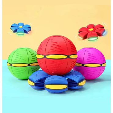Colorful toy balls with eye-like designs on a blue and yellow background