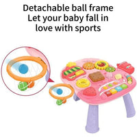 Children's toy table with detachable ball frame and colorful toys on a white background