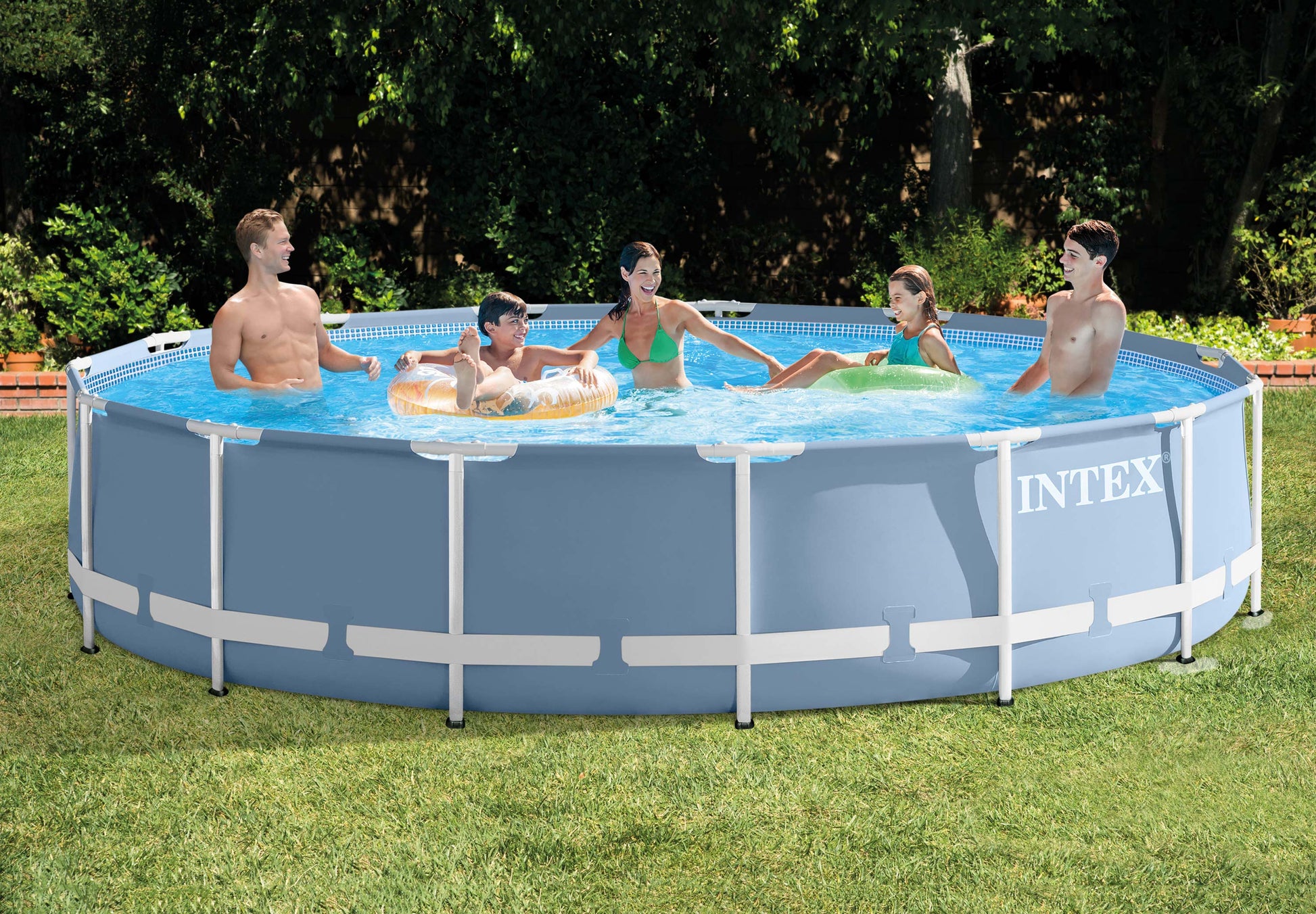 Family enjoying a swim in an Intex above-ground pool outdoors.