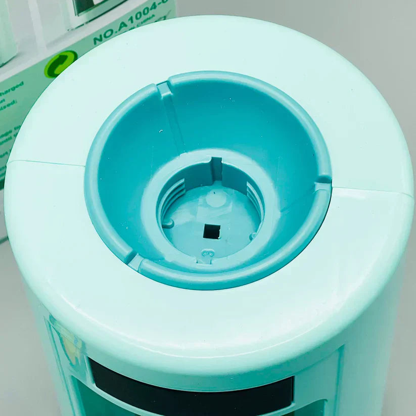 Close-up of a teal plastic container with a lid on a white background