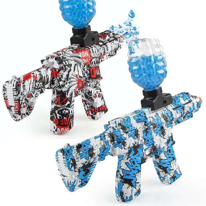 Two toy guns with graffiti-style design and blue crystal-like attachments on a white background