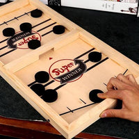 Wooden game board with 'Super Winner' branding, being played on a dark surface.