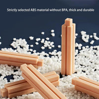 Beige plastic bars on a bed of white ABS plastic granules with text about material properties.