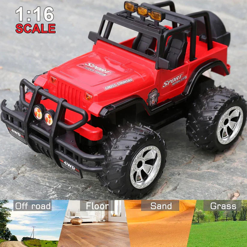 Red toy off-road vehicle with black details on a textured surface, showing scale and terrain适应性.