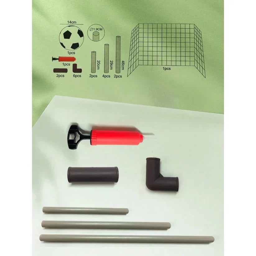 Children's soccer goal kit with components on a white background