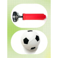 Colorful toy set with a red bucket, green shovel, and orange sandcastle mold on a textured surface.