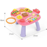 Pink toy kitchen set with various components on a white background