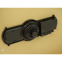 Black fan assembly on a beige background